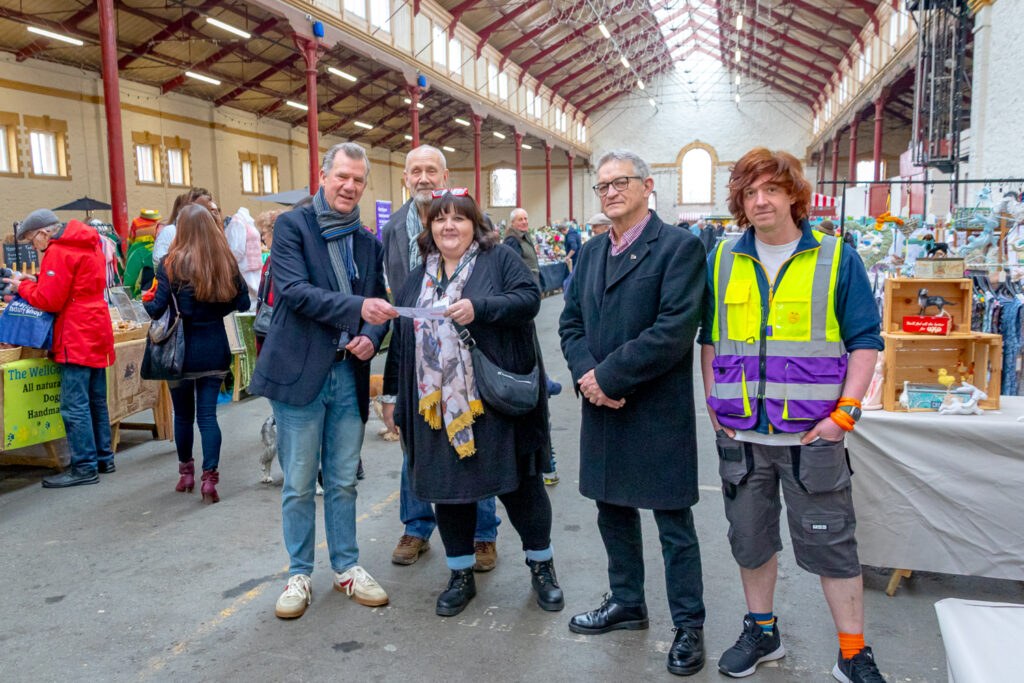 A group inside the market supporting the local food bank