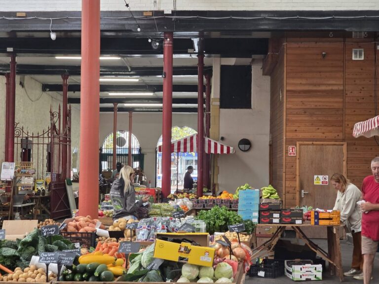 Fruit and vegetables arranged for sale inside the market